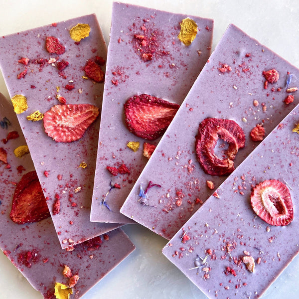 Vegan Black Currant Bar with Strawberries and Edible Flowers